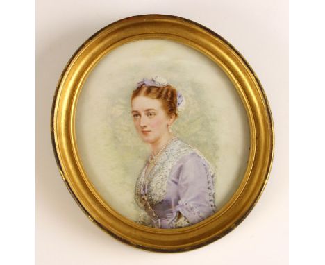 English school (late 19th century),An oval bust length portrait miniature depicting a young lady wearing a lace trimmed lilac