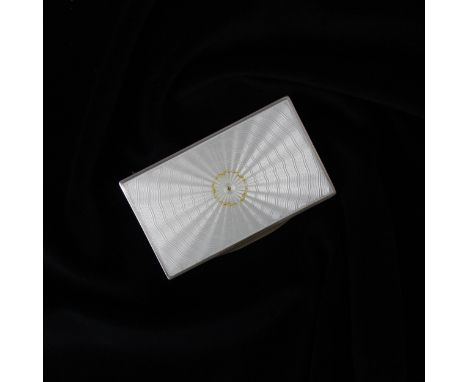An early 20th century French enamel and silver box, the rectangular hinged cover with white and gilt guilloche enamel opening