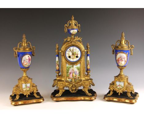 A French gilt metal mounted and blue porcelain Sevres type clock garniture, late 19th century, the 8cm porcelain dial indisti