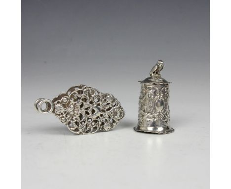 A Victorian silver clip, Rosenthal Jacob and Co, London 1886, of organic openwork form, 7cm long, with a Continental novelty 