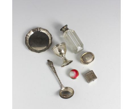 A selection of white metal and silver plated items, including a white metal mounted combination scent bottle and match strike