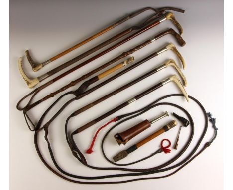 A silver mounted Brigg hunting whip and whistle, London 1932, the grip 22cm long; with a further hunting whistle, a Kohler &a