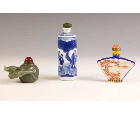 Three Chinese snuff bottles, comprising; a carved jade example in the form of a gourd, with red coloured stopper, 6.5cm wide,