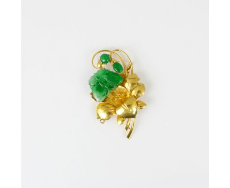 A Chinese yellow metal 'jade' brooch, the yellow metal brooch designed as flower with carved butterfly upon leaf and further 