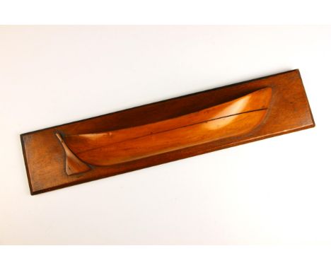 A scratch built half hull model of a sailing vessel, early 20th century, 35.5cm long, set to a mahogany plaque, 48cm long ove