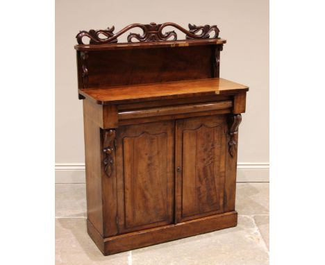 A Victorian mahogany chiffonier sideboard, of cottage proportions, the raised back with an openwork foliate pediment and sing