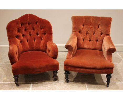 A Victorian button back armchair, in red velour, the button back over padded scrolled arms, upon ebonised inverted baluster f
