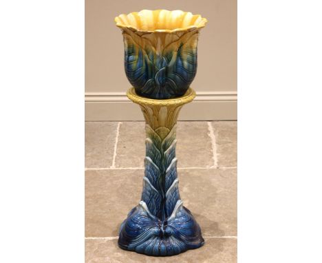 A William Ault majolica jardiniere and stand in the manner of Christopher Dresser, later 19th century, of typical form decora