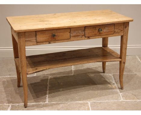 A 19th century pine side table, the rectangular top over a pair of frieze drawers, upon tapering legs and outswept feet unite