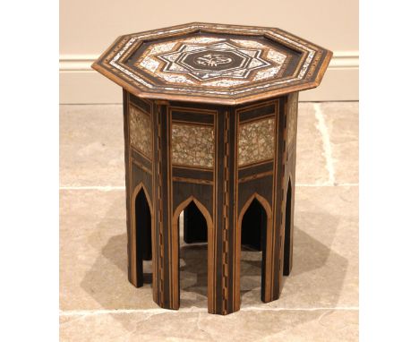 A Syrian mother of pearl inlaid occasional table of octagonal form, 19th century, ebonised and inlaid with mother of pearl pa