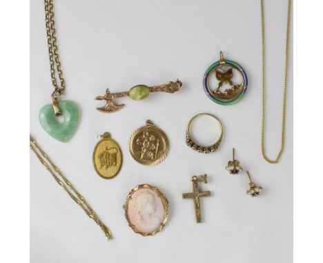 A selection of jewellery, including three 9ct pendants, green hardstone Celtic style brooch, cameo, jade coloured heart penda