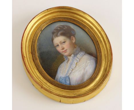 English school (late 19th or early 20th century),An oval bust length portrait miniature depicting a young lady wearing a whit