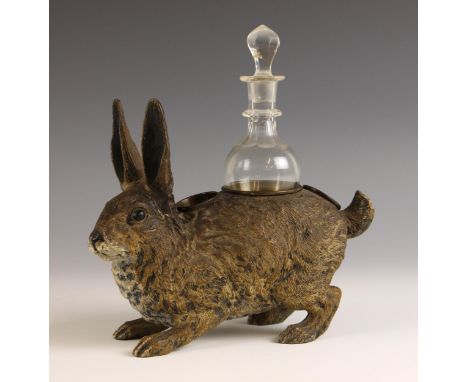 A cold painted spelter model of a rabbit in the manner of Bergman, 20th century, the body designed as a cruet holder, the rab