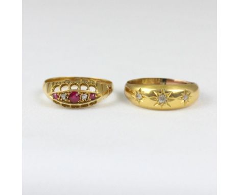 An early 20th century ruby and diamond ring, the three graduated rubies with rose cut diamonds set in between, in openwork 18