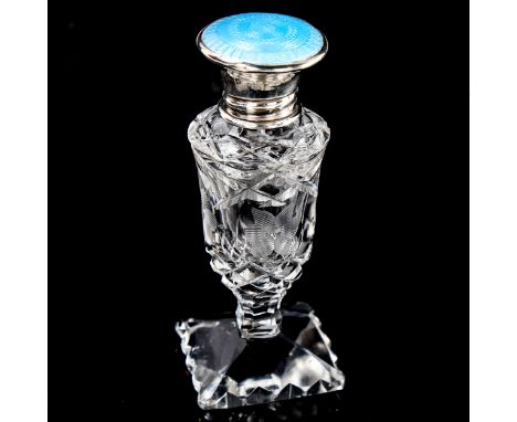 A cut-glass silver and blue enamel topped perfume bottle, Birmingham 1929, height 9.5cm 