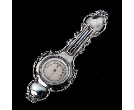 An unusual miniature silver-cased banjo-shaped barometer and thermometer, with cast surround, length 20.5cm, indistinct hallm