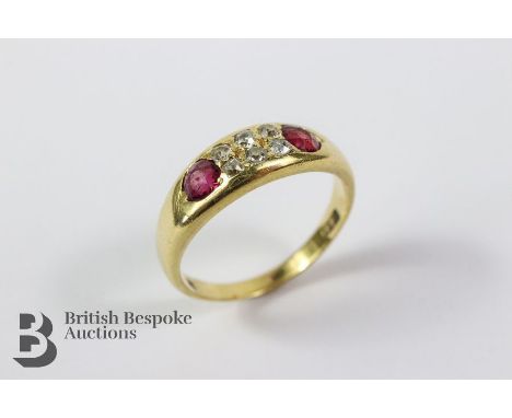 19th century 18ct ruby and diamond gypsy ring, size P, approx 4.6 gms. The ring set with two rubies approx 3.75mm (worn) and 