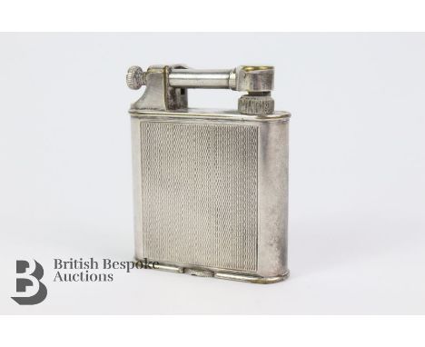 Dunhill stainless steel lighter, having an engine-turned case, patent nr 390107.&nbsp;