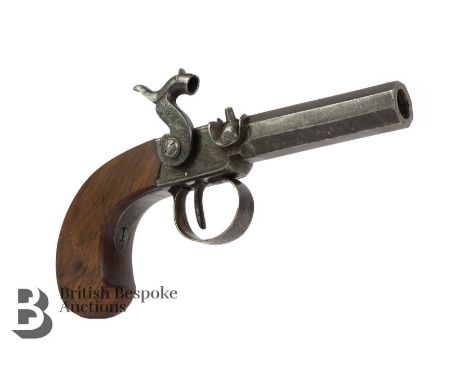 Mid-19th century side hammer percussion pocket pistol, with a slab sided walnut grip, turn off barrel with an engraved frame 
