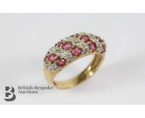 9ct gold ruby and diamond ring, size J, the ring set with twelve rubies approx 2 x 2.5mm and 7pts of eight-cut dias, approx 3