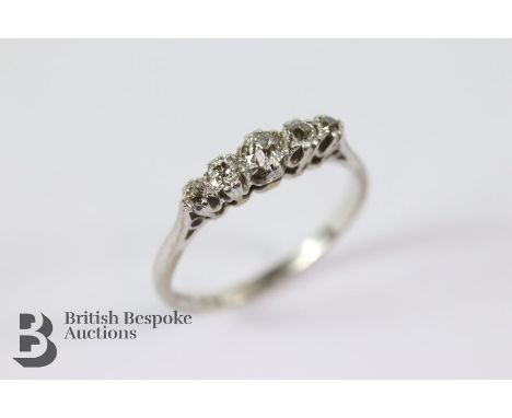 Antique 18ct gold and platinum diamond ring. The ring set with five graduated old-cut diamonds, 25 pts, size P, approx 2.66 g