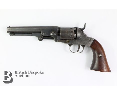.31 pocket six-shot revolver, having a walnut stock, the framed engraved date December 27 1859, barrel stamped 6, stamped the