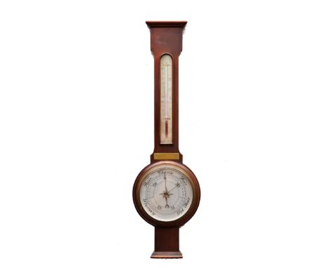 A 1920s mahogany cased aneroid wheel barometer with silvered dial and spirit tube thermometer over, 72cm high