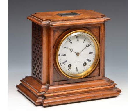 A French walnut mantel clock the slightly convex white enamel Roman dial signed Taylor & Son of Paris & Bristol with moon han