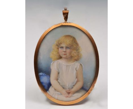 19th Century oval portrait  of a child with blond hair, 19cm maximum
