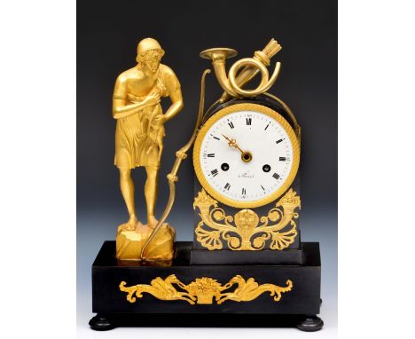 An early 19th Century French mantel clock with white enamel Roman dial, the twin train drum movement with silk suspension and