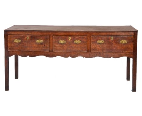 18th Century oak dresser base with three drawers to front, on square cut supports, 87cm high, 179cm wide