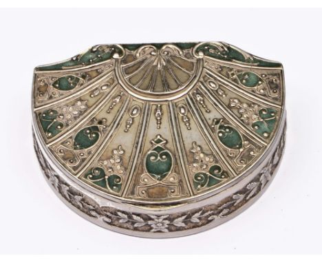 French silver pill box of demi-lune form with relief decoration and pale green enamel panels