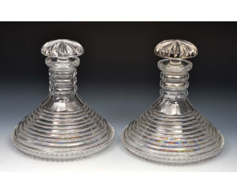 Pair of glass ships decanters of cut ring form, 21cm high