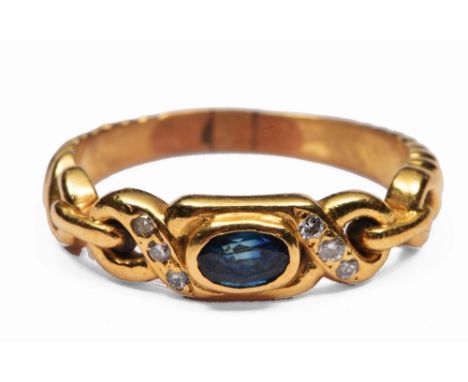 Yellow metal ring stylised sapphire and diamond setting, tests as 18ct