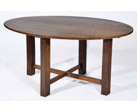 Gordon Russell oak dining table circa 1930, the oval top on four reeded supports, the Russell Worcester Limited Broadway plaq