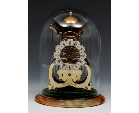 A Thwaites & Reed brass skeleton clock with silvered Roman chapter ring, platform lever escapement and passing bell strike up