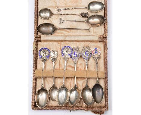 (Of golfing interest) Four silver and enamel spoons, each inscribed Davyhulme Park G.C, a single silver golfing spoon, anothe