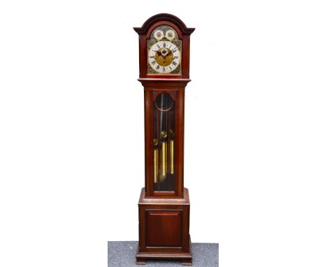 A mahogany longcase clock the brass break arch dial with silvered Roman chapter ring, Arabic five minutes, matted centre and 