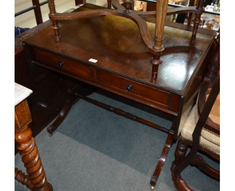 19th Century mahogany sofa table the rectangular top having reeded edges over two short drawers on splayed legs joined by a t