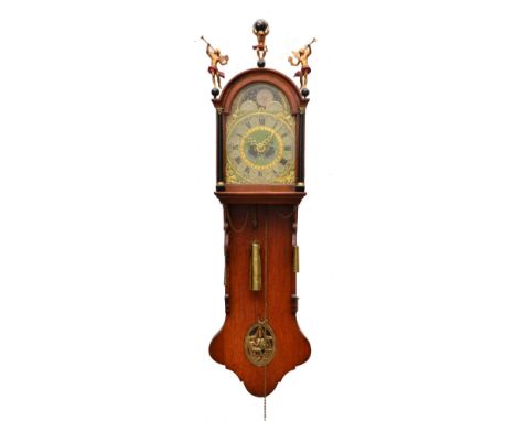 A 19th Century Dutch Friesland Staartklok, the apple green and gilt painted break arch dial with Roman chapter ring and Arabi