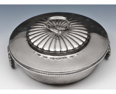 Silver warming dish of circular form, with gadroon border and ring handles, the lid of fluted decoration with presentation in
