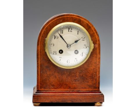 A burr walnut mantel clock the convex silvered Arabic dial with engine turned centre, twin train Japy movement with coiled go