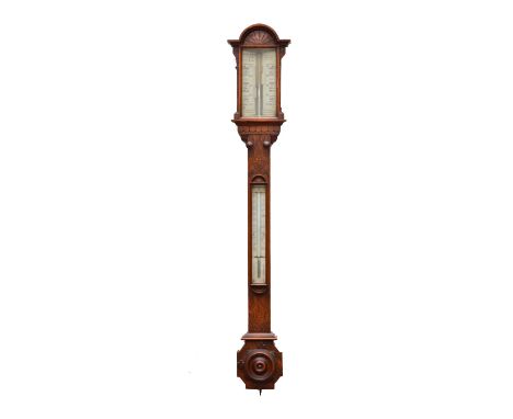 A Victorian oak stick barometer with twin angled ivory vernier scales, one signed Dring & Fage, London, with concealed mercur