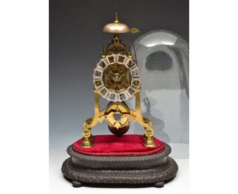 A Victorian brass skeleton clock with silvered and pierced Roman chapter ring, single chain fusee and passing bell strike wit