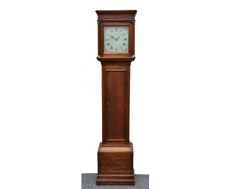 An early 19th century oak 30 hour longcase clock with 11" square painted Roman dial, Arabic five minutes and floral decorated