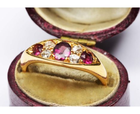 18ct gold ring with stylised ruby and amethyst setting