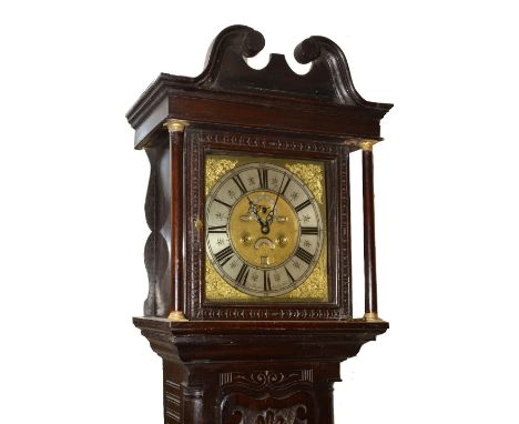 An 18th Century month duration longcase clock movement the 12" square brass dial with silvered Roman chapter ring, Arabic fiv