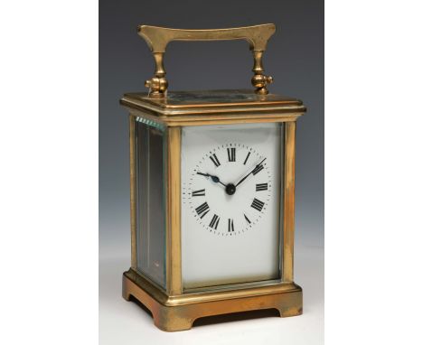 A French brass carriage timepiece with white enamel Roman dial and platform lever escapement, 11cm high