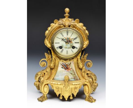 A 19th Century French ormolu mantel clock the porcelain Roman dial painted with a pair of mallards, the Japy twin train movem