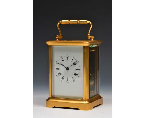 A French carriage clock  with white enamel Roman dial and Arabic five minutes, silvered platform lever escapement and coiled 
